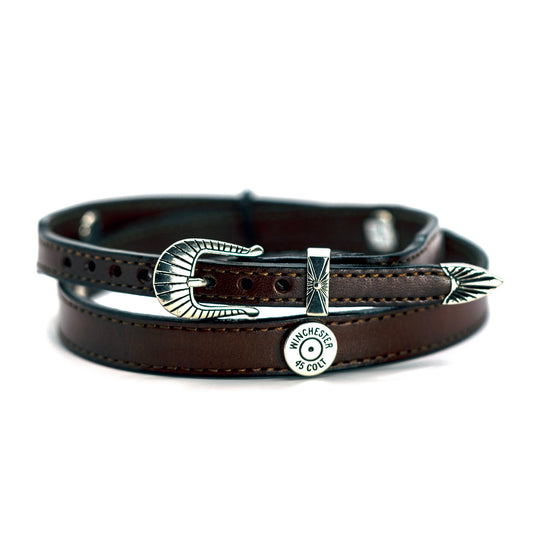 Make Ready Range Wear 45 Colt inspired hatband. Hatband is 1/2" wide and 28" long. Designed with an adjustable buckle closure for the perfect fit. Made in USA.